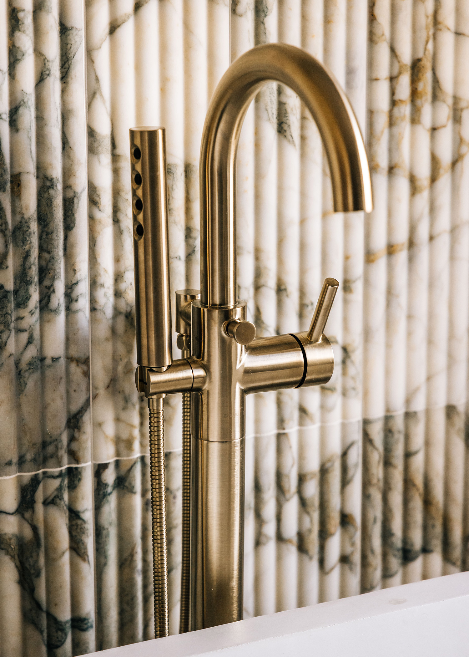 a design-build sink faucet